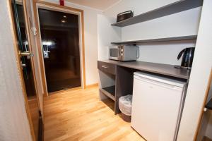 Kuchyň nebo kuchyňský kout v ubytování F2 Hotel