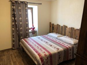 Postel nebo postele na pokoji v ubytování Maison Lucien