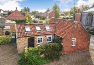 an aerial view of an old brick house at The Old Stable in Sleaford