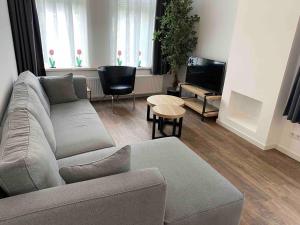 Χώρος καθιστικού στο HaagsHuisje- eigen appartement, dichtbij alles, stijlvol