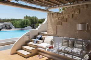 a set of stairs leading to a swimming pool at La Peschiera in Savelletri di Fasano