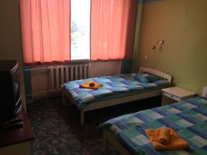 Postel nebo postele na pokoji v ubytování Hermes Külalistemaja + 6 fotografií