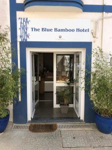 a blue entrance to a blue bamboo hotel at The Blue Bamboo Hotel - Duna Parque Group - "Ex Casa dos Arcos" in Vila Nova de Milfontes