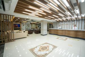 The lobby or reception area at Lion City Hotel Kizilay