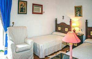 A bed or beds in a room at CASA RURAL LA FLORIDA, MORÓN de la FRONTERA