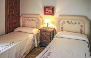 A bed or beds in a room at CASA RURAL LA FLORIDA, MORÓN de la FRONTERA