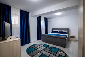 Postel nebo postele na pokoji v ubytování Simona Apartaments