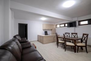Kuchyň nebo kuchyňský kout v ubytování Simona Apartaments