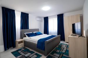 Postel nebo postele na pokoji v ubytování Simona Apartaments