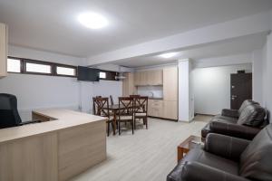 Kuchyň nebo kuchyňský kout v ubytování Simona Apartaments