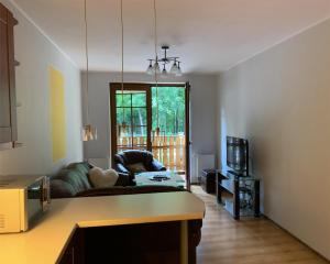 Posedenie v ubytovaní Apartament o Zachodzie Słońca Nadrzeczna