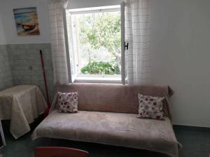Postel nebo postele na pokoji v ubytování Apartments Sandra