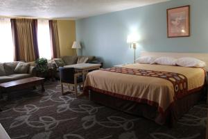 Tempat tidur dalam kamar di Super 8 by Wyndham Nephi
