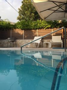 A piscina em ou perto de Villa Lithos Parga