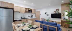 a kitchen and dining room with a table and chairs at Ada Dreams City in Fethiye