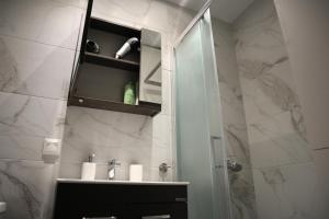 Kúpeľňa v ubytovaní Ladadika Luxury Studios