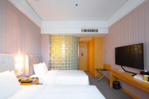 Imagen de la galería de Holiday Inn Express Nantong Xinghu, an IHG Hotel, en Nantong