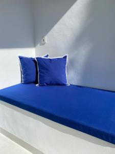 Postel nebo postele na pokoji v ubytování Kura Kura Divers Lodge