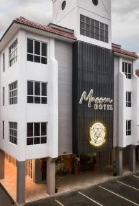 a building with a moroccan hotel sign on it at Masson Hotel Butterworth in Perai