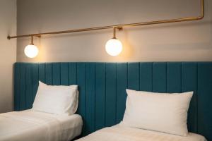 Masson Hotel Butterworth客房内的一张或多张床位