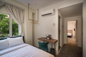 Masson Hotel Butterworth客房内的一张或多张床位