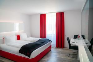 Ένα ή περισσότερα κρεβάτια σε δωμάτιο στο Hotel Andante Rust