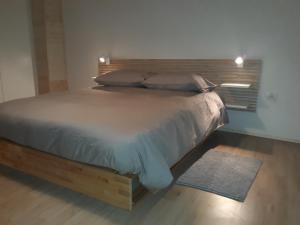 Postel nebo postele na pokoji v ubytování Apartmaji Hedera