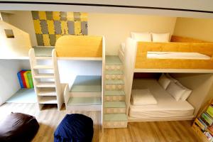 Postel nebo postele na pokoji v ubytování 日月潭五船民宿 5Boat B&B