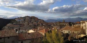 a view of a town with houses and mountains at B&B La Dimora Della Zarina in Mormanno