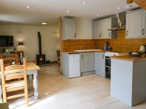 Køkken eller tekøkken på Foxstones Cottage
