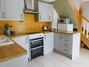 Køkken eller tekøkken på Foxstones Cottage + 10 billeder