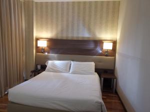 Posteľ alebo postele v izbe v ubytovaní Charme Hotel