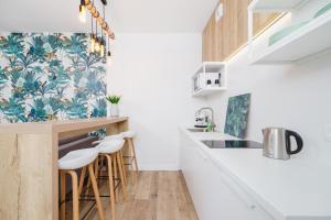 Virtuvė arba virtuvėlė apgyvendinimo įstaigoje Apartament 3d GO by Renters