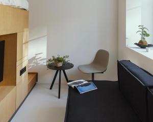 Posedenie v ubytovaní Owntown Apart Hotel