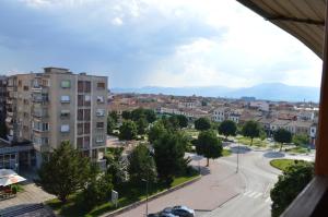 a view of a city from a building at INN Korça, Center City Apartament in Korçë