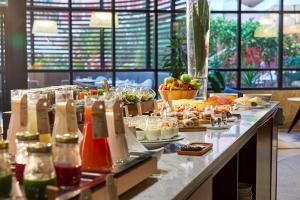 a buffet line with many different types of food at Sir Anthony in Playa de las Americas