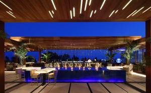 a view of a restaurant with blue lighting at Four Seasons Hotel in Limassol