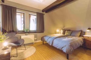 Postel nebo postele na pokoji v ubytování EDELFUCHS-LODGE