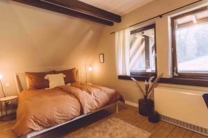 Postel nebo postele na pokoji v ubytování EDELFUCHS-LODGE