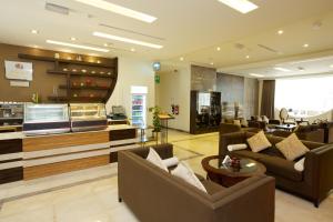 Coin salon dans l'établissement Nehal Hotel