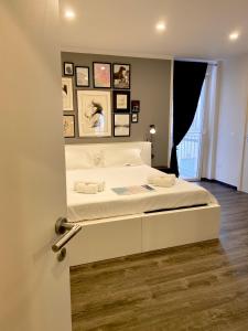 Postel nebo postele na pokoji v ubytování Mimì Rooms&Studios