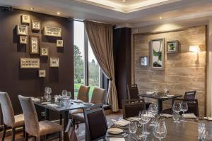A restaurant or other place to eat at Castle Green Hotel In Kendal, BW Premier Collection 