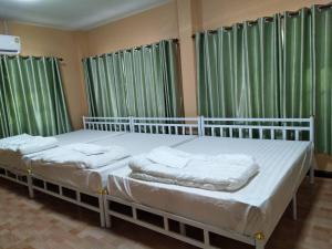 Ένα ή περισσότερα κρεβάτια σε δωμάτιο στο 19th house