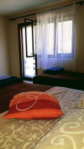 A bed or beds in a room at Apartment Sijakovic