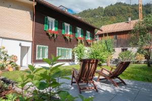 Zahrada ubytování ALP APARTMENTS centre location with traditional design and self check-in