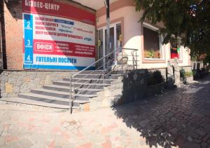 a set of stairs in front of a building at Бізнес Центр & Готель в Центрі Міста in Umanʼ