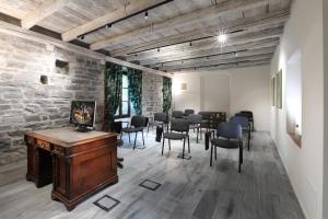 TV a/nebo společenská místnost v ubytování Suites&Atelier Lake Como