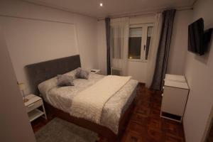 Cama o camas de una habitación en Apartamento Playa del Sardinero