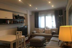 Зона вітальні в Apartamento Playa del Sardinero