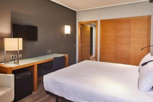 Cama o camas de una habitación en Hotel Silken Indautxu